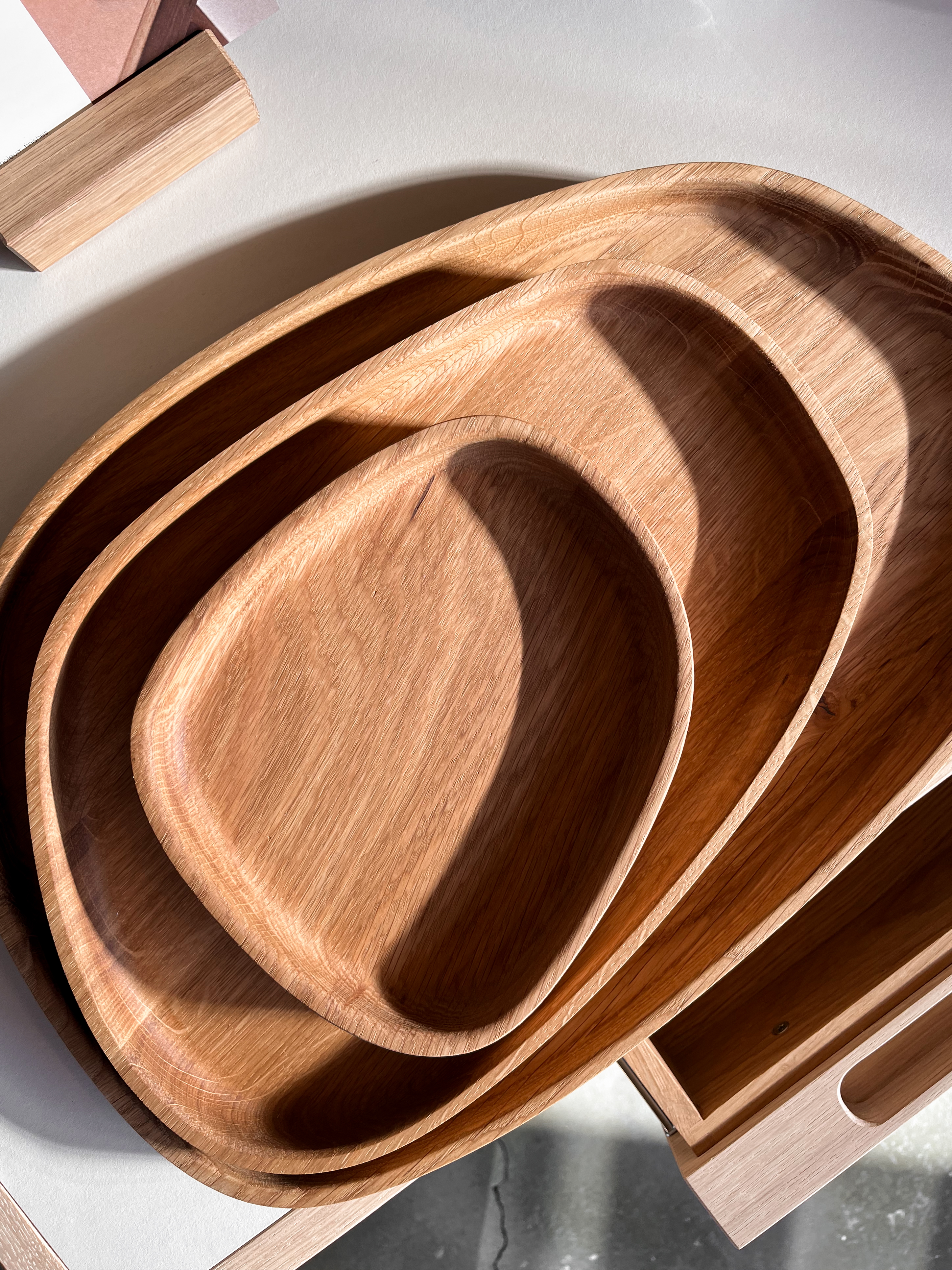 Nested solid oak trays in the Bend, Oregon showroom